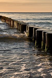 Preview wallpaper logs, pilings, sea, waves, splashes, wet