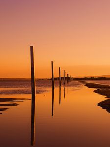 Preview wallpaper logs, water, reflection, horizon, twilight