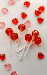 Preview wallpaper lollipops, candy, hearts, red, pink