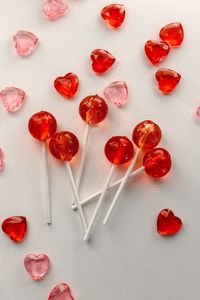 Preview wallpaper lollipops, candy, hearts, red, pink