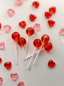 Preview wallpaper lollipops, candy, hearts, red, pink