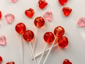 Preview wallpaper lollipops, candy, hearts, red, pink