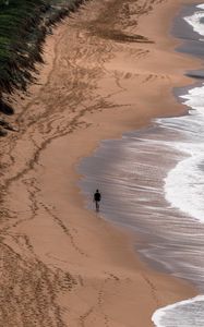 Preview wallpaper loneliness, alone, coast, walk, sea