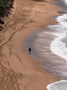 Preview wallpaper loneliness, alone, coast, walk, sea