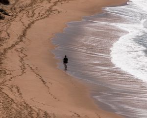 Preview wallpaper loneliness, alone, coast, walk, sea