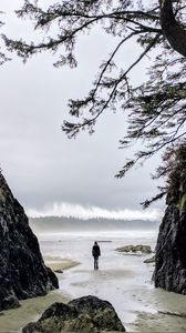 Preview wallpaper loneliness, alone, man, rocks, coast