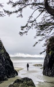 Preview wallpaper loneliness, alone, man, rocks, coast