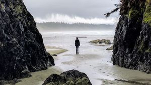 Preview wallpaper loneliness, alone, man, rocks, coast