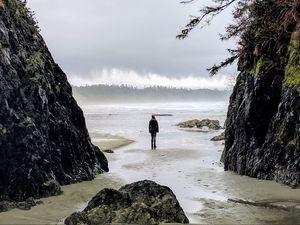 Preview wallpaper loneliness, alone, man, rocks, coast