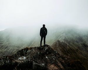 Preview wallpaper loneliness, alone, man, rocks, fog