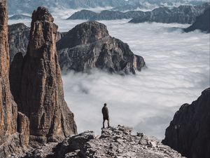 Preview wallpaper loneliness, alone, man, rocks, clouds