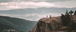 Preview wallpaper loneliness, alone, rock, mountains, sky