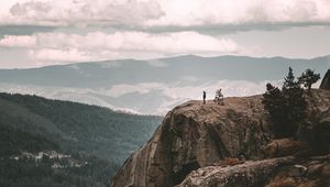 Preview wallpaper loneliness, alone, rock, mountains, sky