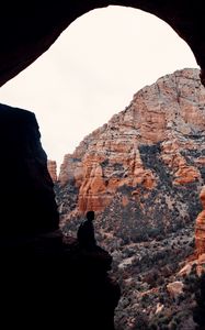 Preview wallpaper loneliness, alone, rocks, cave