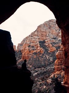 Preview wallpaper loneliness, alone, rocks, cave