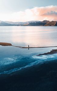 Preview wallpaper loneliness, alone, sea, mountains, sky