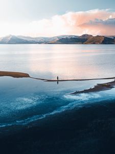 Preview wallpaper loneliness, alone, sea, mountains, sky