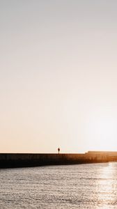 Preview wallpaper loneliness, alone, silhouette, pier, sea