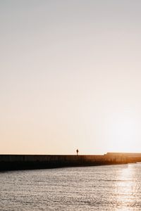 Preview wallpaper loneliness, alone, silhouette, pier, sea