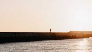 Preview wallpaper loneliness, alone, silhouette, pier, sea