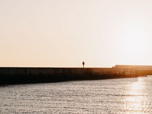 Preview wallpaper loneliness, alone, silhouette, pier, sea