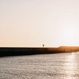 Preview wallpaper loneliness, alone, silhouette, pier, sea