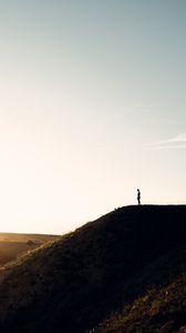 Preview wallpaper loneliness, alone, silhouette, slope, sky