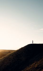 Preview wallpaper loneliness, alone, silhouette, slope, sky