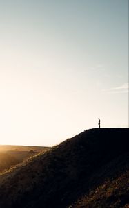 Preview wallpaper loneliness, alone, silhouette, slope, sky