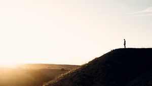 Preview wallpaper loneliness, alone, silhouette, slope, sky