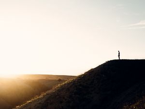 Preview wallpaper loneliness, alone, silhouette, slope, sky