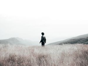 Preview wallpaper loneliness, field, hat, man