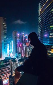 Preview wallpaper loneliness, roof, mask, skyscraper, night city