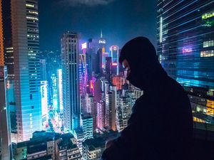 Preview wallpaper loneliness, roof, mask, skyscraper, night city