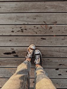 Preview wallpaper loneliness, sneakers, legs, wooden