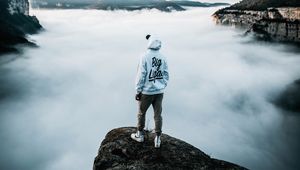 Preview wallpaper lonely, loneliness, cap, sneakers, fog