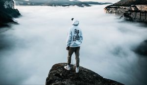 Preview wallpaper lonely, loneliness, cap, sneakers, fog