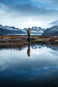 Preview wallpaper lonely, loneliness, mountains, grass, reflection