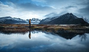 Preview wallpaper lonely, loneliness, mountains, grass, reflection