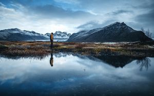 Preview wallpaper lonely, loneliness, mountains, grass, reflection