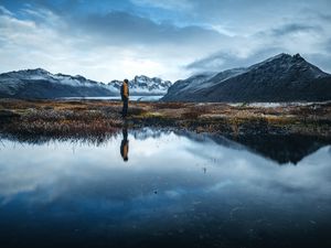 Preview wallpaper lonely, loneliness, mountains, grass, reflection