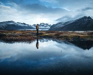 Preview wallpaper lonely, loneliness, mountains, grass, reflection