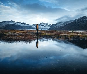 Preview wallpaper lonely, loneliness, mountains, grass, reflection