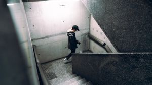 Preview wallpaper lonely, loneliness, photographer, cap, stairs