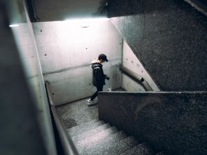 Preview wallpaper lonely, loneliness, photographer, cap, stairs