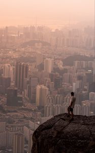 Preview wallpaper lonely, loneliness, rock, city