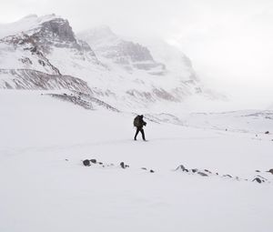 Preview wallpaper lonely, loneliness, rocks, snow