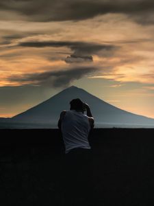Preview wallpaper lonely, photographer, silhouette, mountain