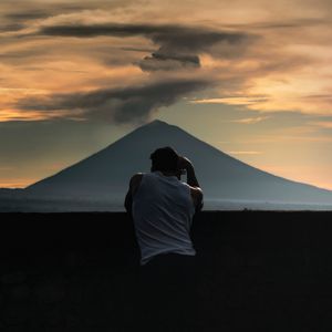 Preview wallpaper lonely, photographer, silhouette, mountain