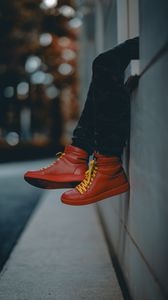 Preview wallpaper lonely, sneakers, red, legs, street